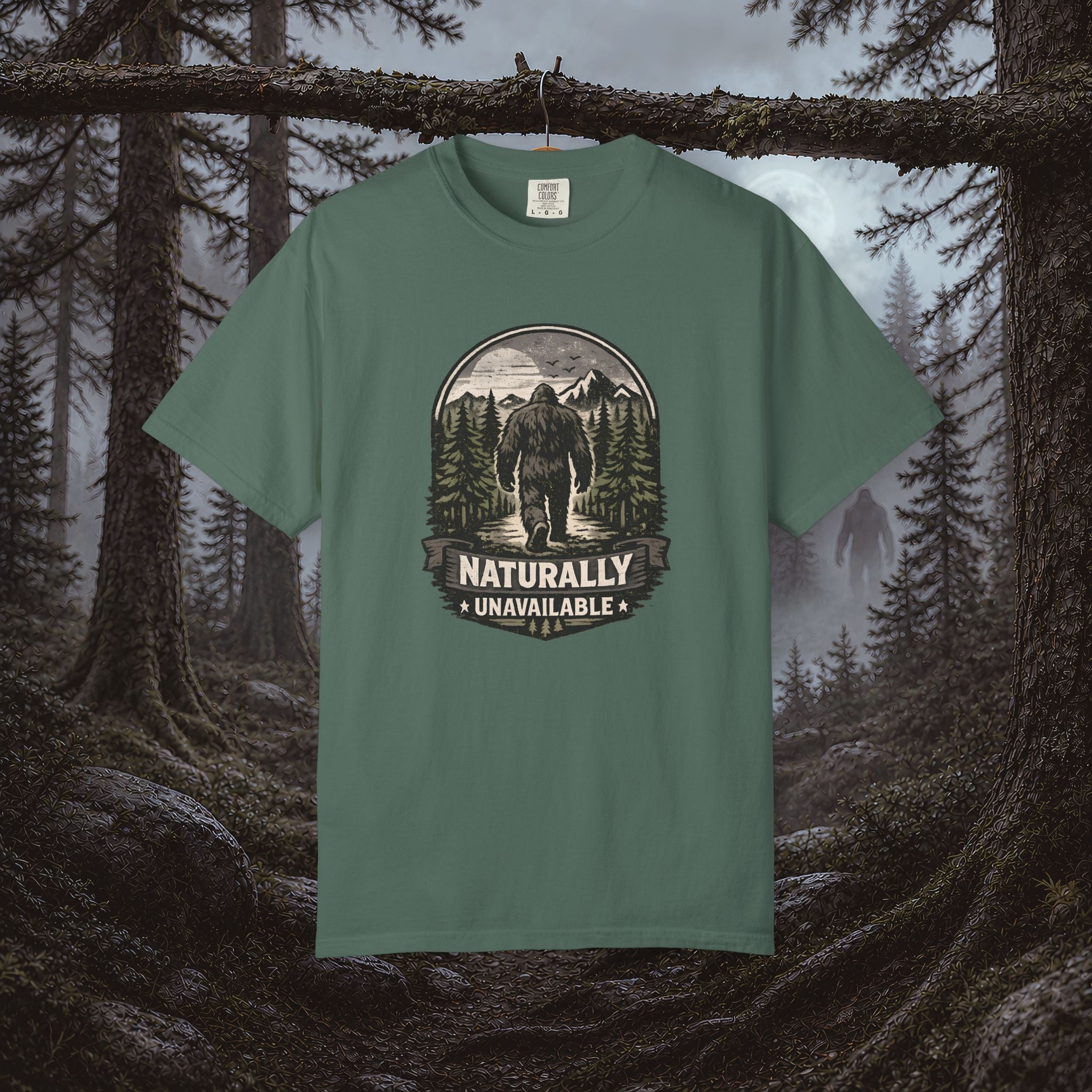 Bigfoot 'Naturally Unavailable' T-Shirt — Bigfoot Walking Into Forest Graphic