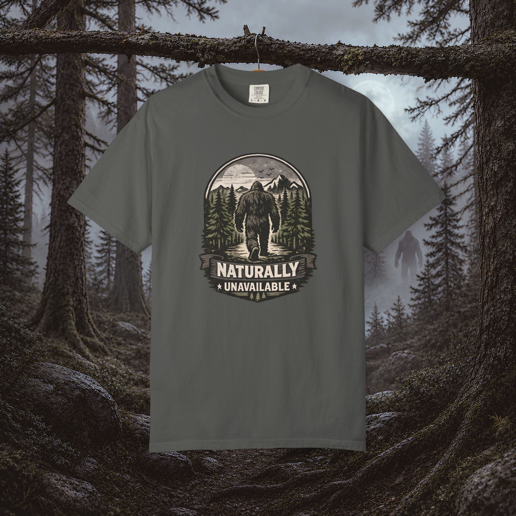 Bigfoot 'Naturally Unavailable' T-Shirt — Bigfoot Walking Into Forest Graphic