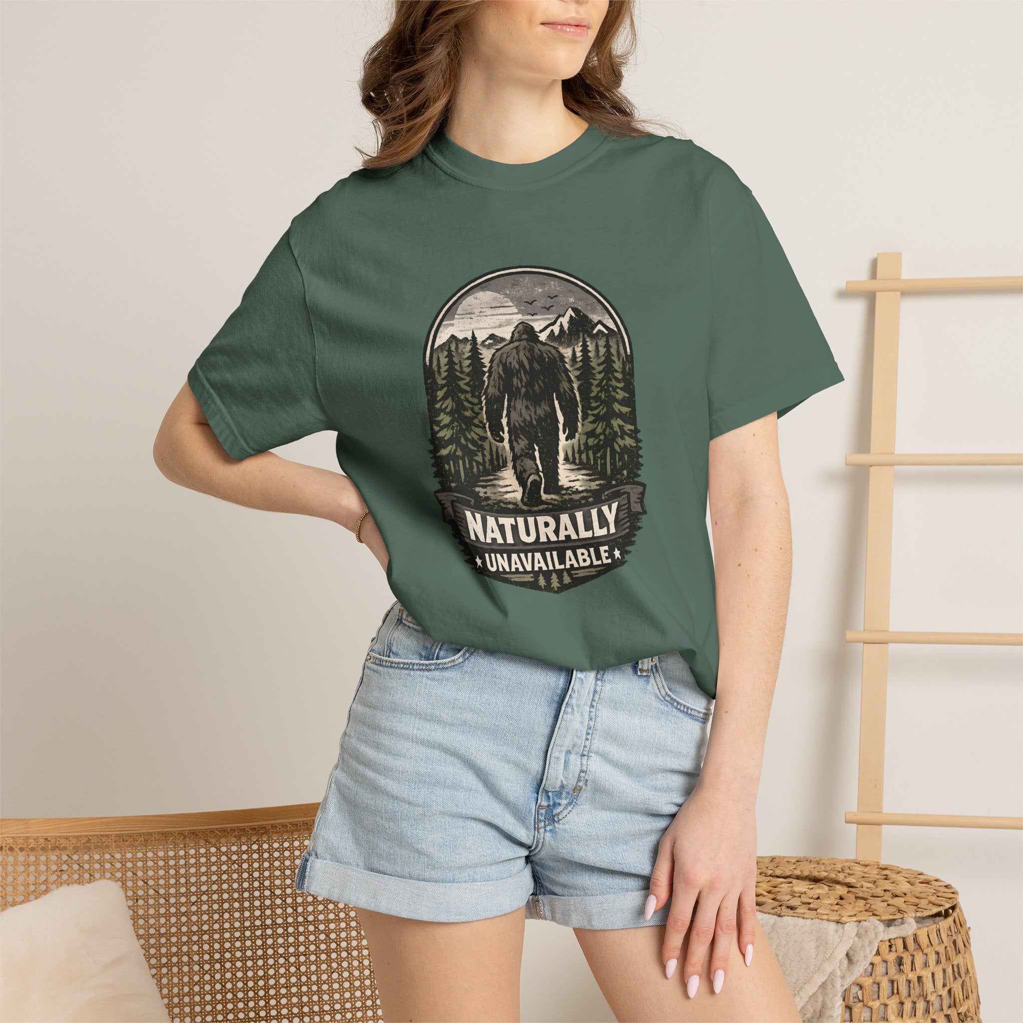 Bigfoot 'Naturally Unavailable' T-Shirt — Bigfoot Walking Into Forest Graphic