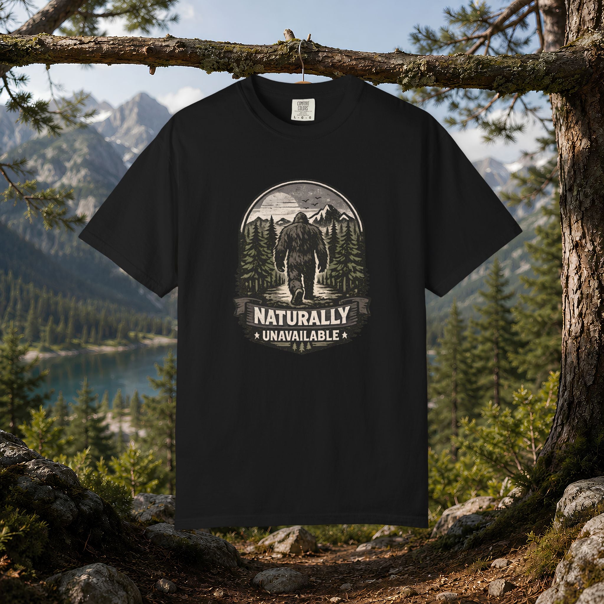 Bigfoot 'Naturally Unavailable' T-Shirt — Bigfoot Walking Into Forest Graphic