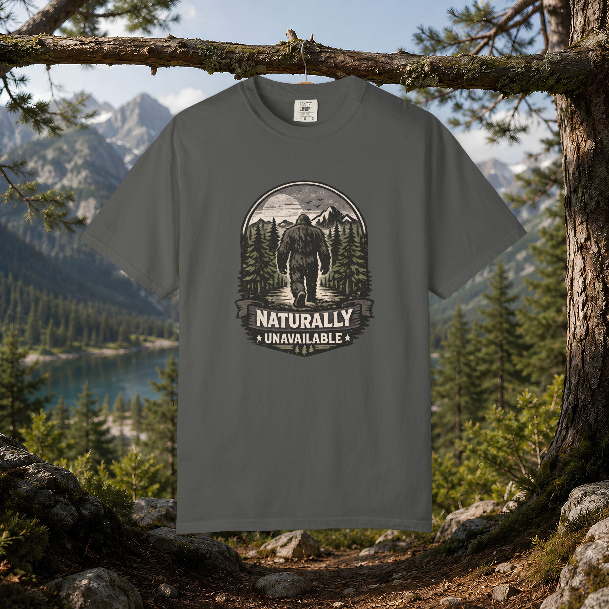 Bigfoot 'Naturally Unavailable' T-Shirt — Bigfoot Walking Into Forest Graphic